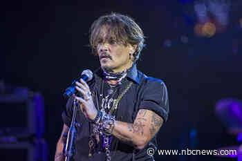 Johnny Depp gives surprise performance at Jeff Beck show in the U.K.