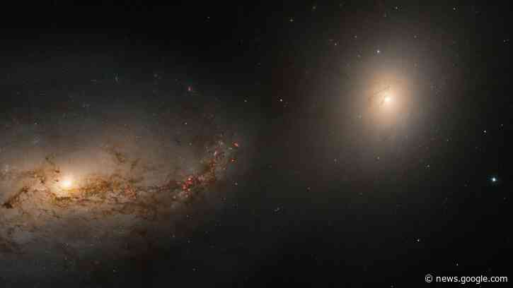 Hubble telescope sees haunting galactic dance of 2 galaxies linked by the corpse of a cannibalized neighbor - Space.com