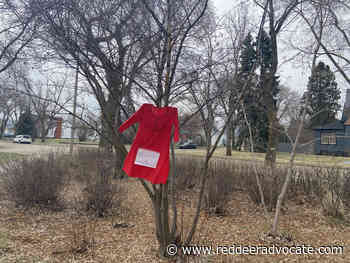 Red dresses hang in Wetaskiwin for Red Dress Day - Red Deer Advocate