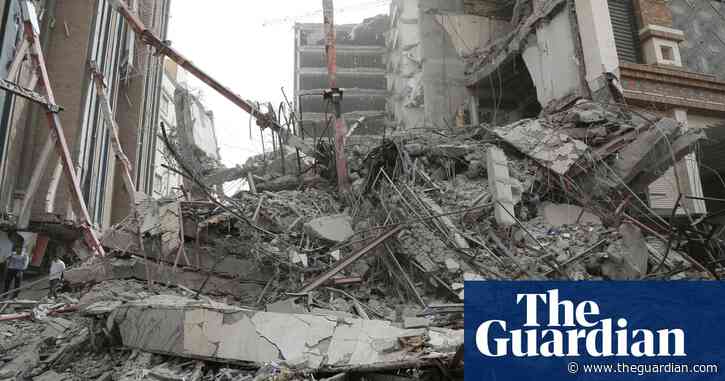 Protesters in Iran shout down cleric amid anger over building collapse