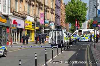 Croydon High Street: Police close road after furniture thrown