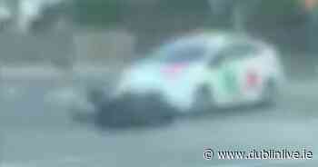 Motorcyclist hit by taxi after falling onto road - Dublin Live