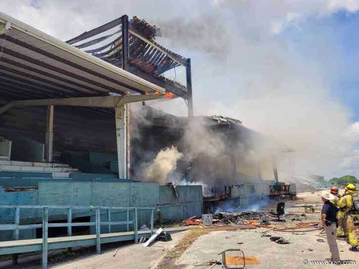 Old racetrack grandstand catches fire in Manor during demolition