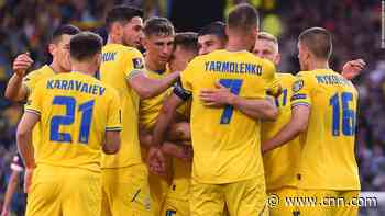 Ukraine players came out wrapped in national flag before delivering impressive win in World Cup bid