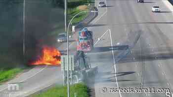 Stalled pickup bursts into flames after being rear-ended near Forest Lake