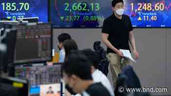 Global shares mixed amid rate hike, COVID, oil price worries - Belleville News-Democrat