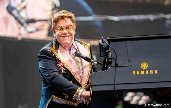 Elton John says he’s “in top health” after being spotted in a wheelchair