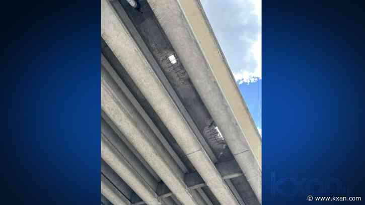 PHOTO: Road damage after 18-wheeler crash on I-35 upper deck