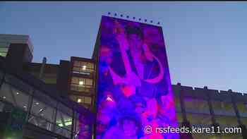 Hundreds gather for unveiling of Prince mural in downtown Minneapolis