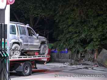 Residents in shock after burning Jeep 'crashes into wall' at petrol station - Express & Star