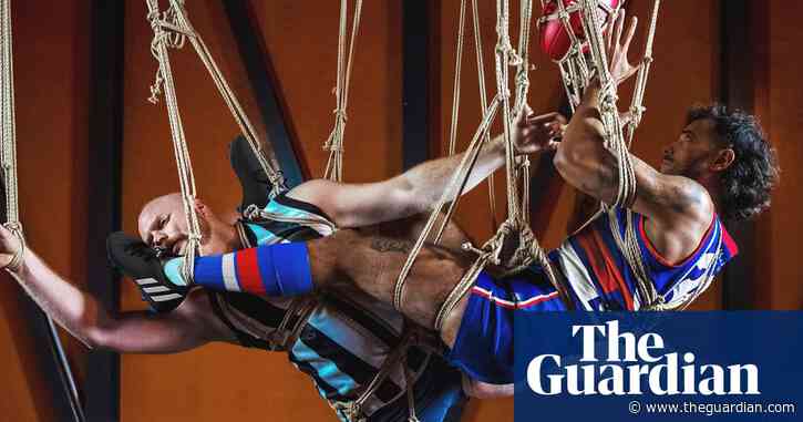 Why five AFL players are being suspended from the ceiling of a Melbourne art gallery