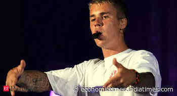 Justin Bieber returns to India with 'Justice World Tour' after 5 yrs, will perform in New Delhi on Oct 18; - Economic Times