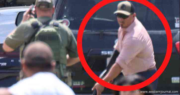 Jaw-Dropping Photo Shows Hero Off-Duty Border Agent with Shotgun Storming School to Save Wife, Daughter and 20 Kids