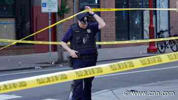 1 arrested, 1 sought in Philadelphia shooting that left 3 people dead, officials say