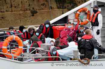 Children with toys carried to safety as migrant crossings resume - The Bolton News
