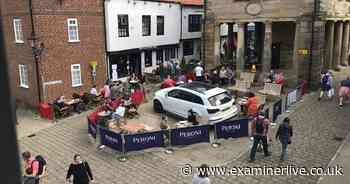 Whitby traders set up shop around Audi after driver parks it illegally and leaves it there for days - Yorkshire Live