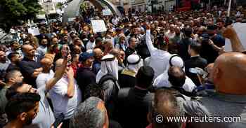 Palestinians pay partial wages amid protests over rise in food prices - Reuters