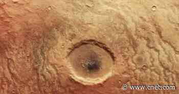 ESA Mars Spacecraft Snaps Dramatic Crater That Looks Like a Human Eyeball     - CNET