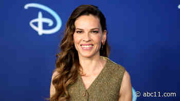 New York woman finds lost dachshund in lap of actress Hilary Swank
