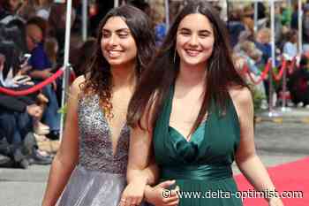 Grad walks are back in Delta - Delta Optimist