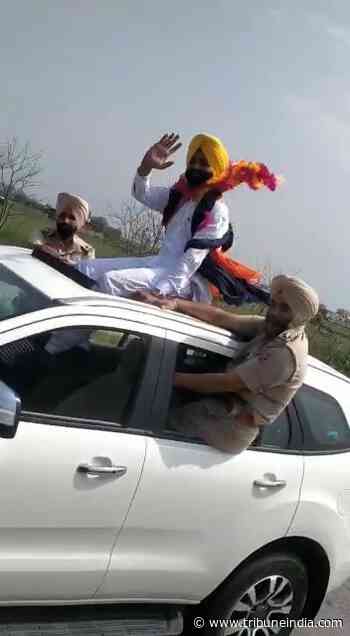 Watch Punjab Transport Minister Laljit Bhullar putting lives of his two guards at risk through life-threatening SUV sunroof stunt - The Tribune India