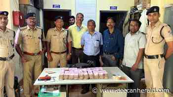 Man attempts to transport Rs 2 crore in train, arrested - Deccan Herald