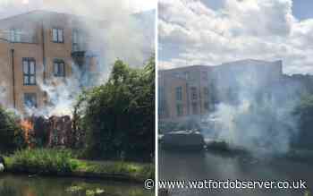Fire breaks out next to Grand Union Canal towpath in Apsley