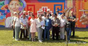 Ecuadoriaanse kunstenaars schilderen muurschilderij op sporthal Evergem-Centrum - Het Laatste Nieuws