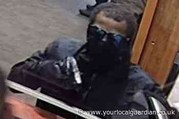 Hunt for man after armed robbery at Croydon bookmaker