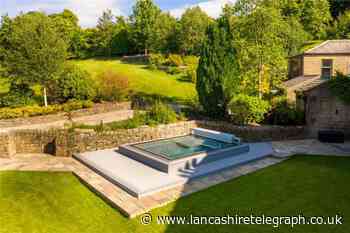 This Pendle £2.95m mansion has helipad, cinema, bar, paddock, jacuzzi and great views of the countryside