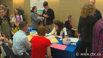 Hundreds of Ukrainian newcomers hand out resumes at Calgary job fair - CBC.ca
