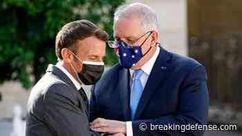 Australia pays up to French sub maker for cancelled deal; Paris reacts positively