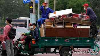 Virus cluster at nightclub sets off new Beijing clampdown - Belleville News-Democrat