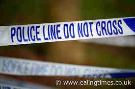 House-to-house inquiries after body found on fire in Northolt park