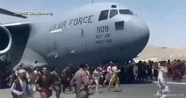 Crew of aircraft found to have human remains in wheel well after leaving Afghanistan cleared of wrongdoing - CBS News