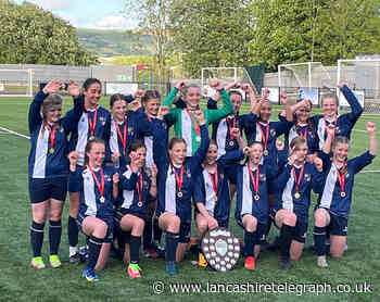 High School football team crowned Champions