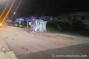 Driver was walking around after late-night truck rollover crash on Killarney Drive