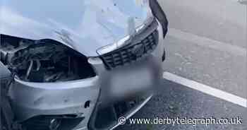 Terrifying dash-cam footage of car getting stuck under lorry and dragged along A38 - Derbyshire Live