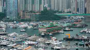 After half a century, Hong Kong's famed floating restaurant is towed away, the latest business sunk by COVID-19