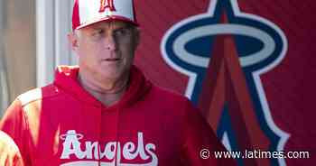 Angels' Phil Nevin shuffles his coaches; Anthony Rendon leaves loss with wrist injury