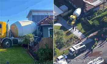 Cement truck crashes into house in Toongabbie, Sydney's west - Daily Mail