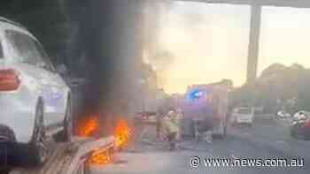 Hero driver rescues truckie on motorway - news.com.au