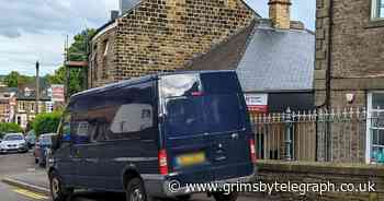 Bafflement as double yellow lines painted around parked Ford Transit van - Grimsby Live - Grimsby Live