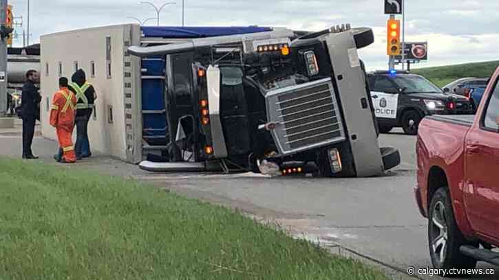 Semi hauling crates of chickens topples in southeast Calgary