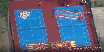 Inflatable slide collapses on school field day, injuring several children