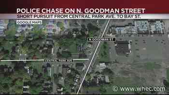 Car pursuit ends with roll-over crash and two detained on North Goodman Street