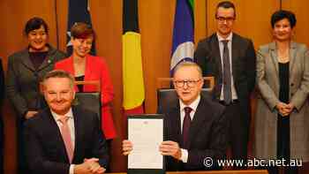 Prime Minister says he has 'drawn a line' under decade of Australia lagging on climate change, as nation steps up commitment