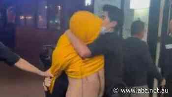 Man recorded struggling with restaurant staff after alleged 'dine and dash' in Adelaide