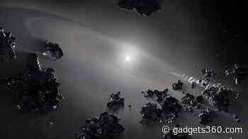 Dead Star Caught Ripping Apart Planetary System in a Rare Incidence of Cosmic Cannibilism