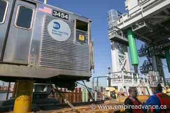Bon voyage: Old subway cars float off across New York Harbor - Virden Empire Advance